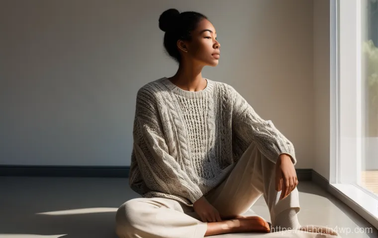 사회적 비판을 극복하는 심리적 방법 - A serene individual, dressed in a comfortable and modest knitted sweater and soft trousers, sits in ...